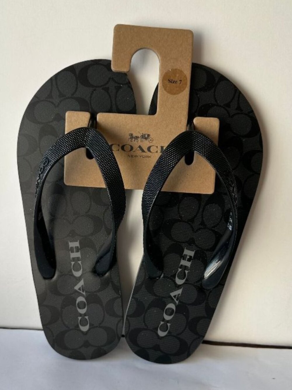 NWT Coach Signature flip flops Size 7